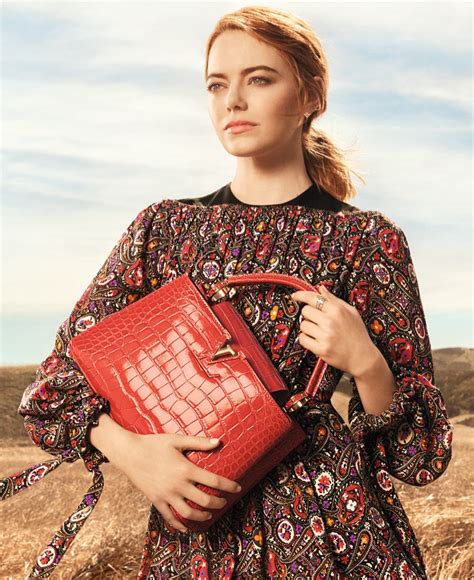 With Emma Stone inside the second video ad campaign for Louis Vuitton